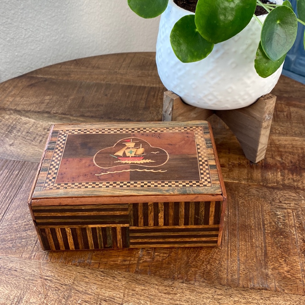 Antique wooden box inlaid w/ sailboat with green cross and sea gull